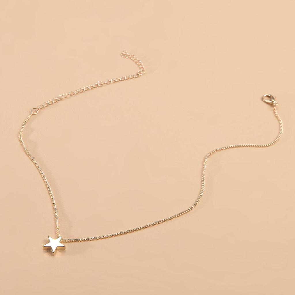 Collar de estrella dorado