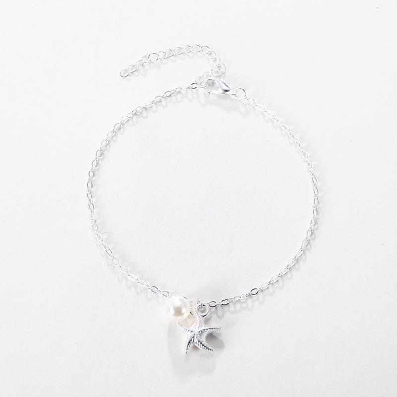 Tobillera plateada de estrella de mar con perla