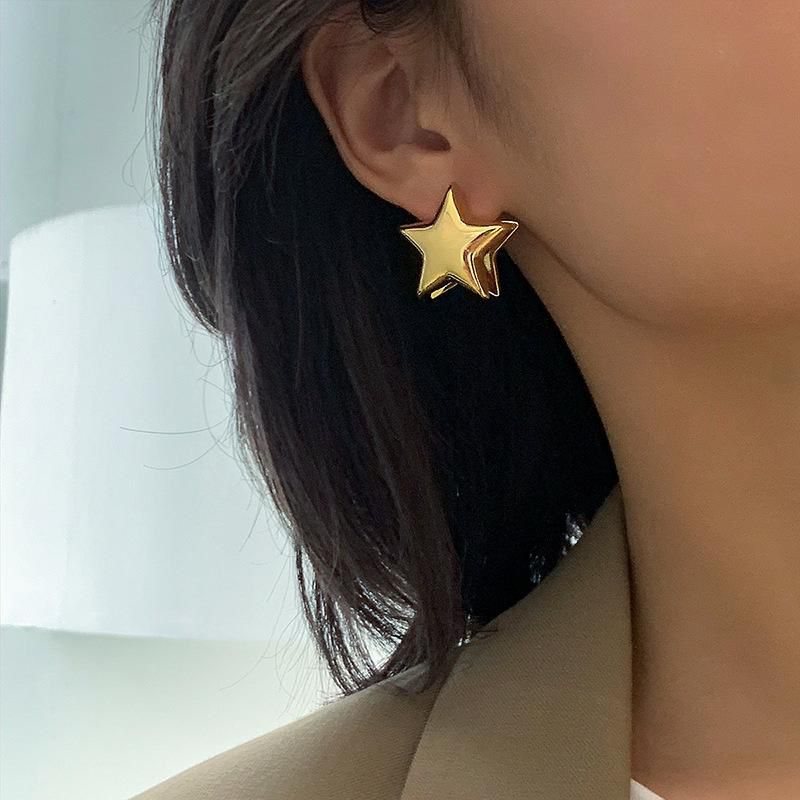 Aretes de estrella dorados