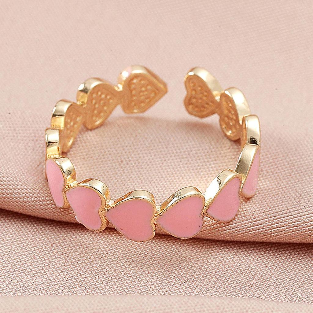 Anillo de corazones rosados