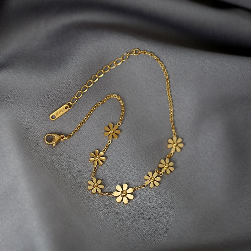 Pulsera de margaritas baño de oro