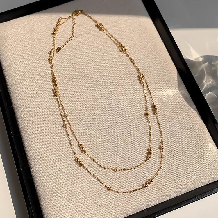 Cadena doble con perlitas baño de oro