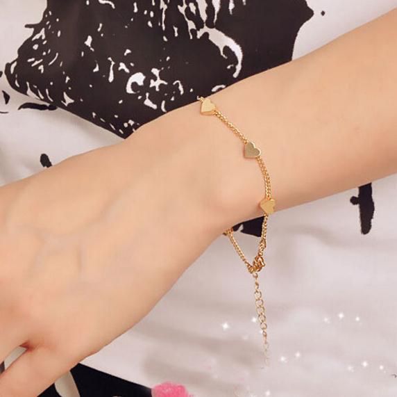 Pulsera de corazones dorada